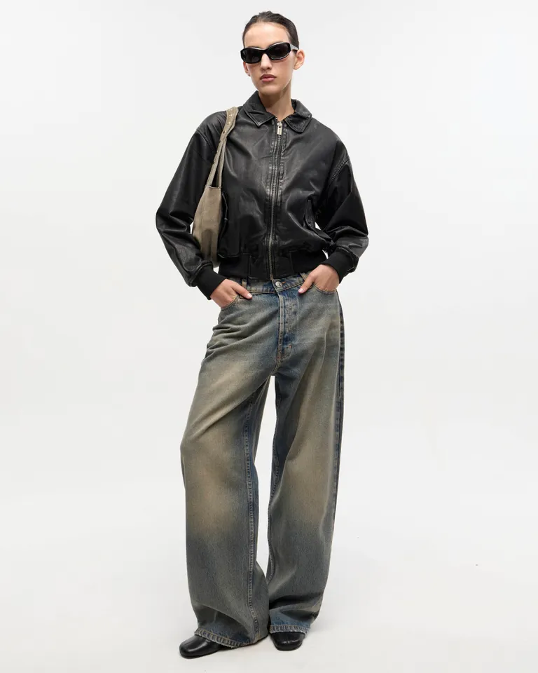 Pantalones wide fit de denim vintage con lavado artesanal en tonos azules y marrones de Ay Not Dead en Pantalones para argentina