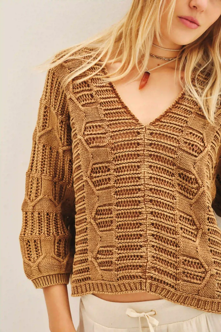 Sweater tejido de algodón con escote en V y mangas amplias de Rapsodia en Buzos y Sweaters para argentina