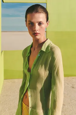 Blusa fluida con textura de Mango en Blusas para argentina