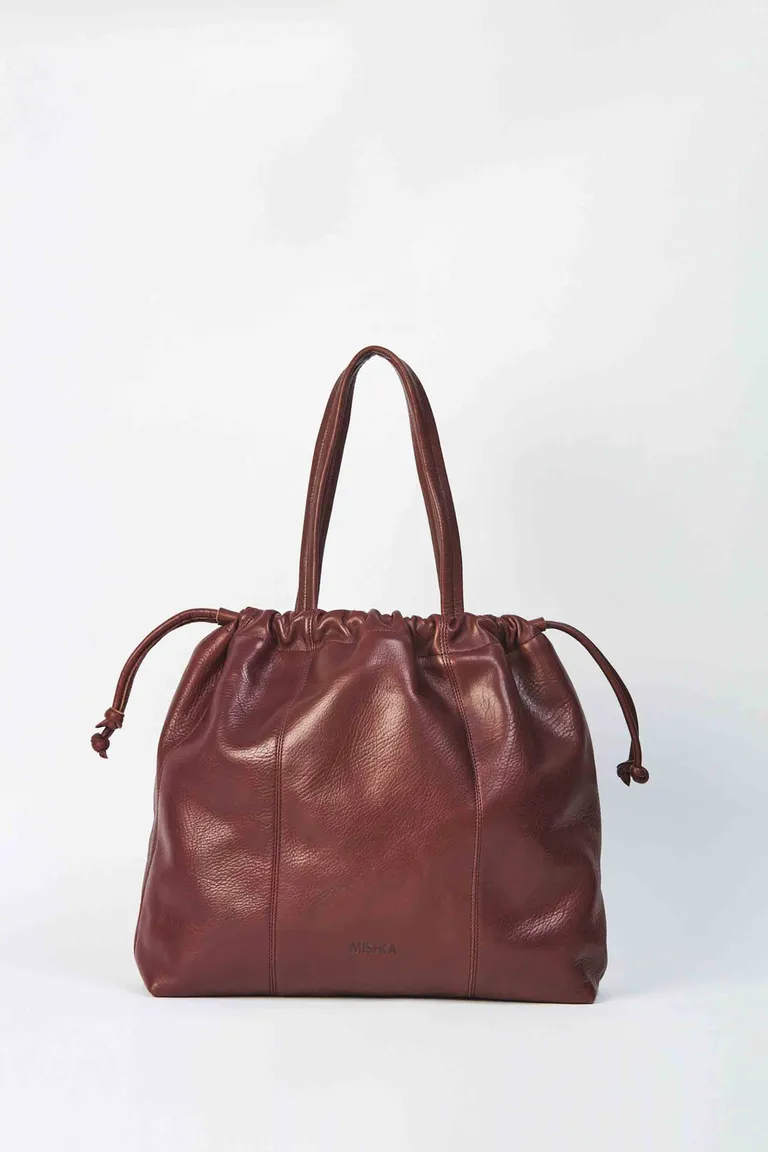 Bolso grande con cierre de cordón ajustable y diseño de hombro de Mishka en Bolsos y Carteras para argentina