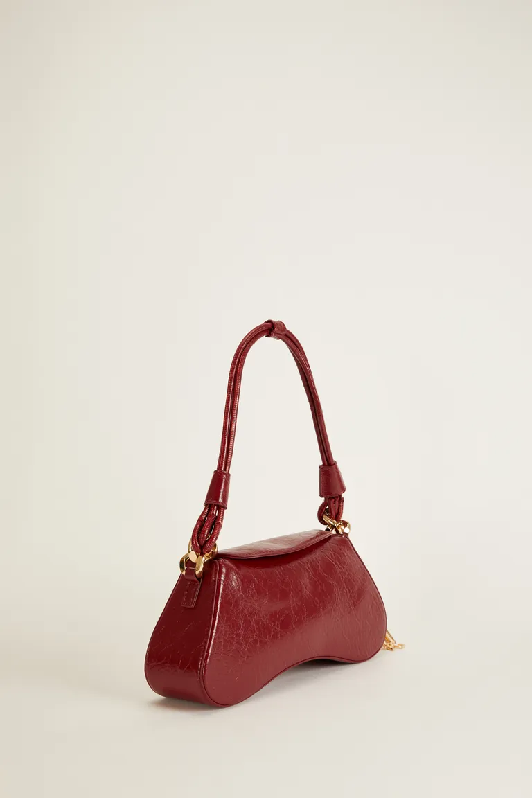 Cartera de cuero ecológico con correa ajustable y llavero de Tucci en Bolsos y Carteras para argentina