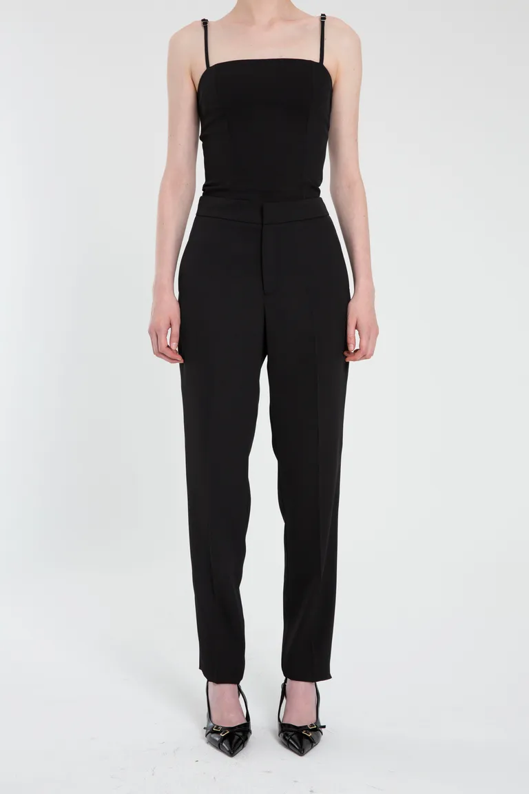 Pantalón de crepe negro con cierre y bolsillos laterales de Naíma en Pantalones para argentina