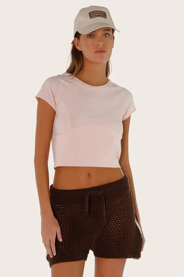 Remera de diseño en rosa con recortes y mangas raglán de Sofia Sarkany en Remeras para argentina