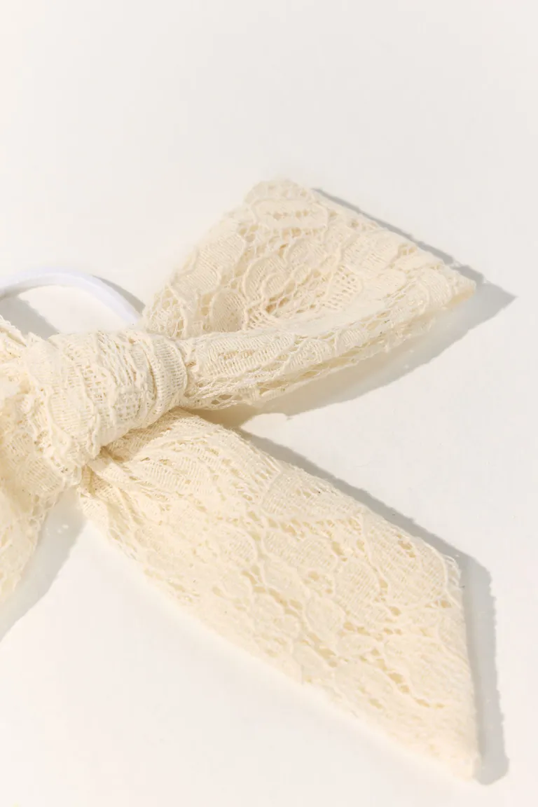 Scrunchie moño con lazo grande de encaje y elástico para peinados de Cuesta Blanca en Bufandas y Pañuelos para argentina
