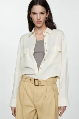 Pantalón lyocell con cinturón de Mango en Pantalones para argentina