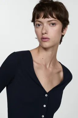 Remera lyocell botonada de Mango en Remeras para argentina