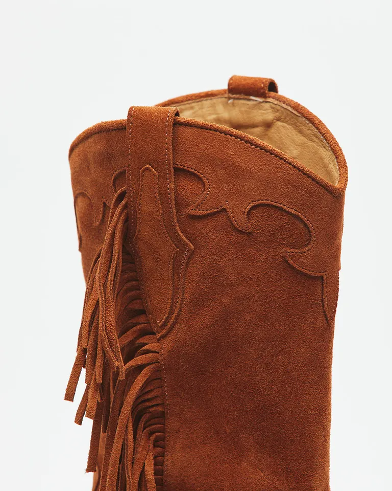 Bota de caña media estilo texano con flecos laterales y cierre de Wanama en Botas y Botinetas para argentina