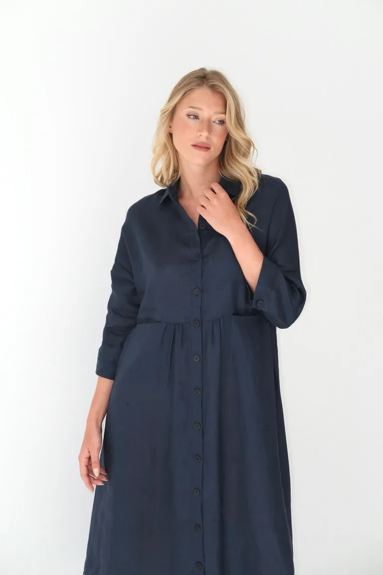 Vestido midi estilo camisero con botones frontales y mangas tres cuartos de Naíma en Vestidos para argentina