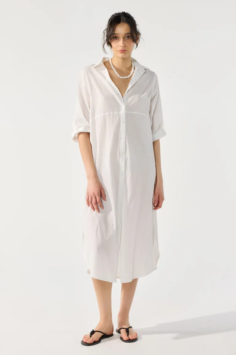 Vestido camisero de gasa en color blanco con manga larga y cierre de botones de Cuesta Blanca en Vestidos para argentina