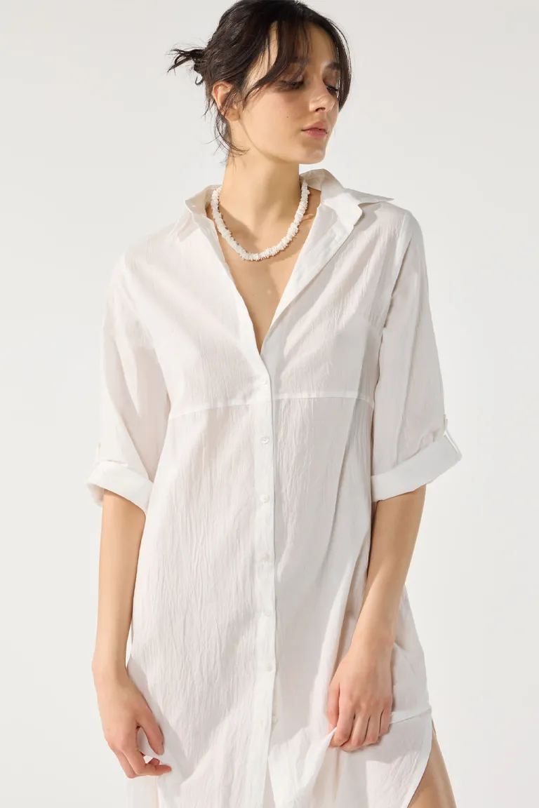 Vestido camisero de gasa en color blanco con manga larga y cierre de botones de Cuesta Blanca en Vestidos para argentina