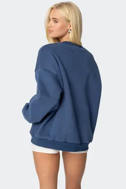 Buzo bordado manchester oversized de Edikted en Buzos y Sweaters para argentina