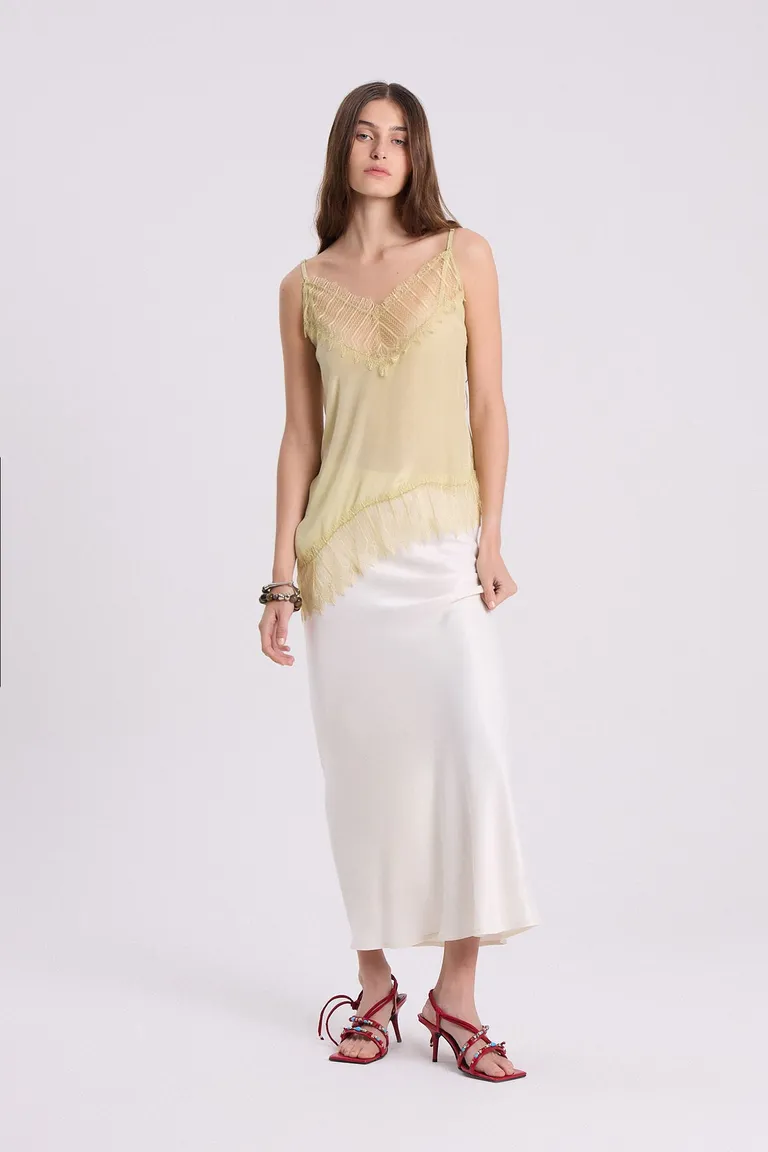 Falda recta de viscosa en tonalidad off-white con caída fluida y elegante de Maria Cher en Faldas para argentina