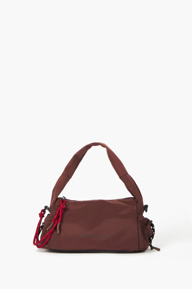 Bolso con compartimentos laterales ajustables y correa bandolera incorporada de Mishka en Bolsos y Carteras para argentina