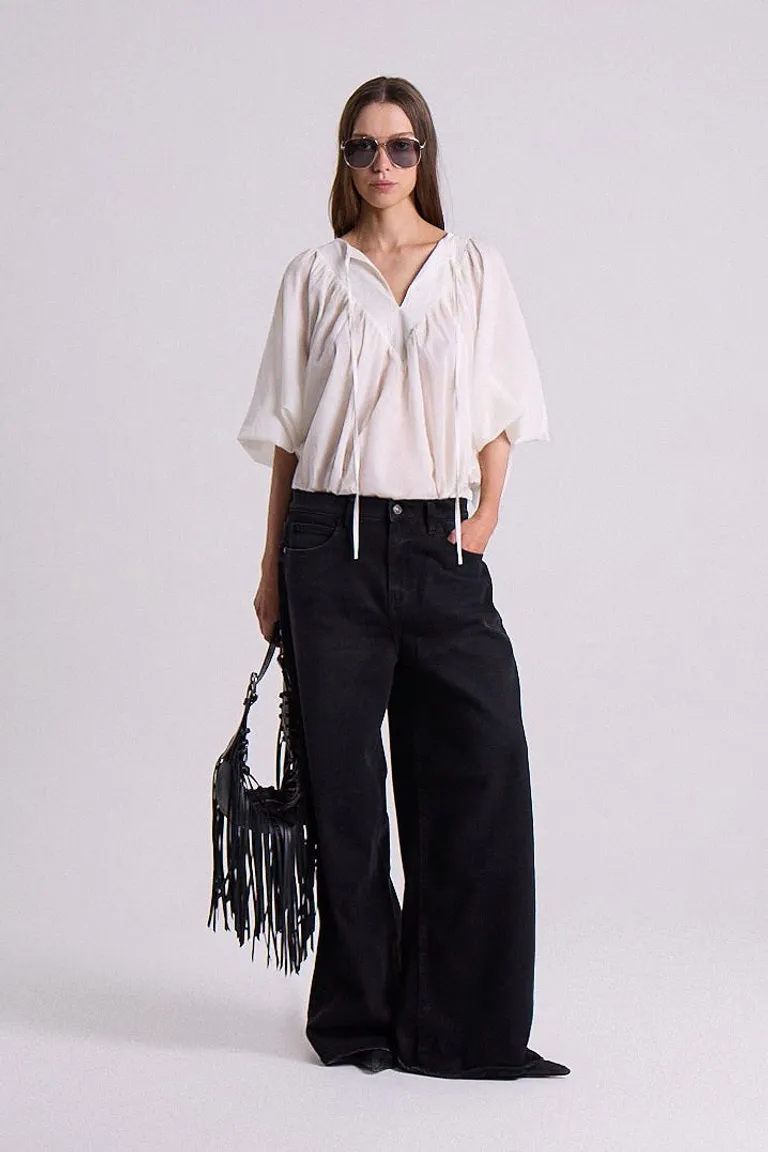 Pantalones Bootcut de tiro medio, silueta relajada y amplia de Maria Cher en Pantalones para argentina