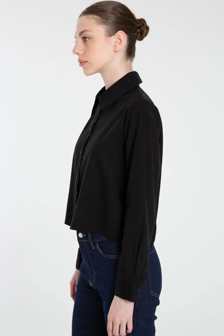 Camisa negra de twill con cuello camisero y cartera de botones de Naíma en Camisas para argentina