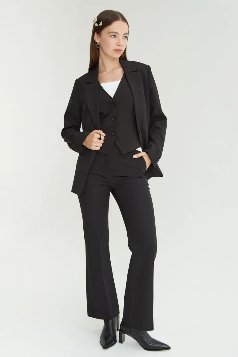 Pantalón sastrero de tiro alto con corte recto y pinzas frontales de Las Pepas en Pantalones para argentina