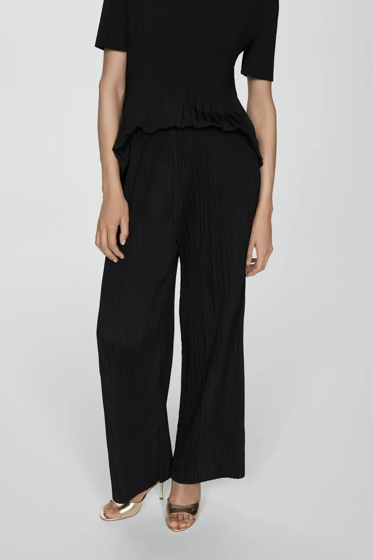 Pantalón plisado fluido de Mango en Pantalones para argentina