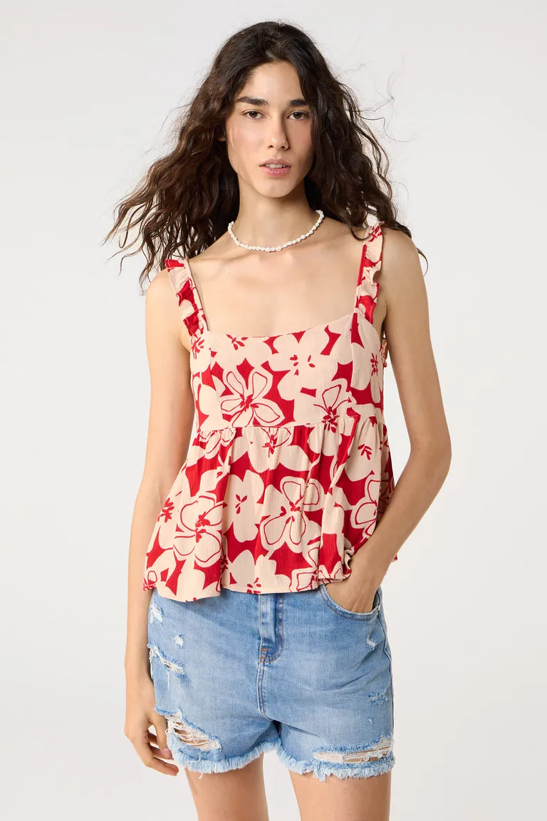 Blusa de mujer con estampado floral en tonos rojos y espalda abierta de Cuesta Blanca en Tops para argentina