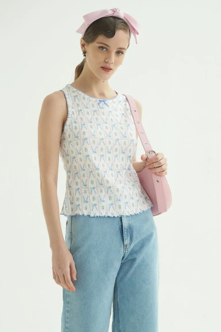 Musculosa de algodón con detalles delicados y moño de satén - Ideal para un look femenino y moderno de Las Pepas en Tops para argentina