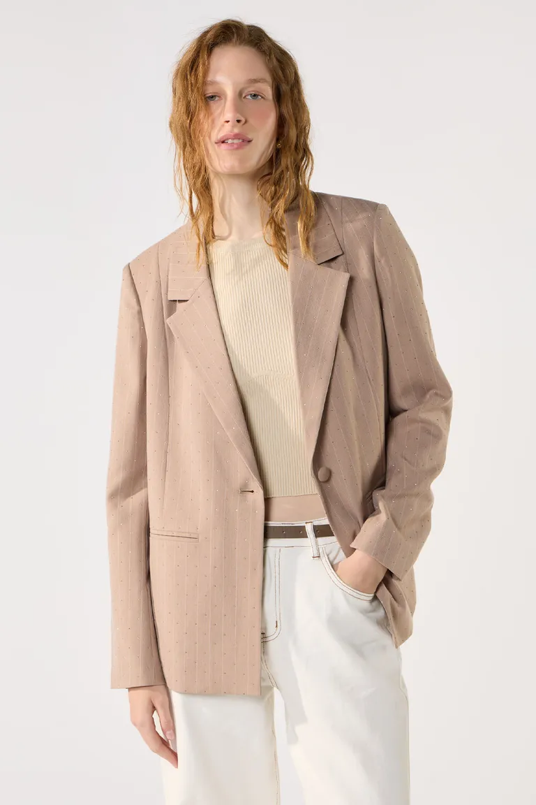 Blazer oversize de tela sastrera con patrón de rayas y hotfix de Cuesta Blanca en Blazers para argentina