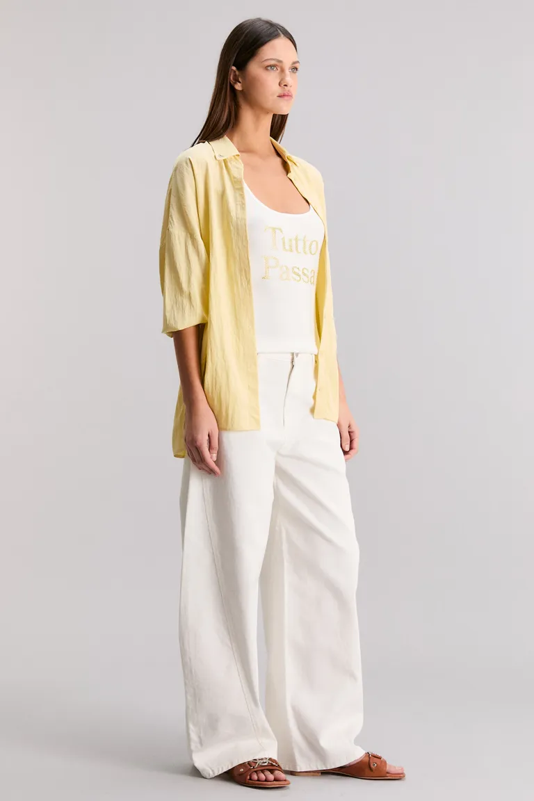 Musculosa amarilla de corte slim con estampado exclusivo de Kosiuko en Tops para argentina