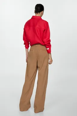 Pantalón wideleg fluido con cinturón de Mango en Pantalones para argentina