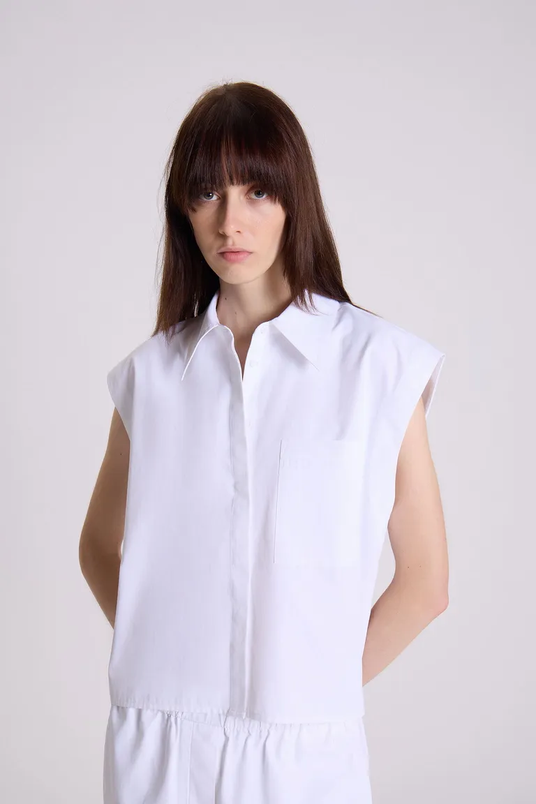 Camisa blanca sin mangas de diseño recto y cuello camisero de Maria Cher en Camisas para argentina