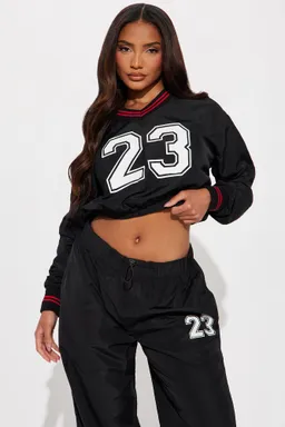 Conjunto pantalón rompevientos de Fashion Nova en Pantalones para argentina
