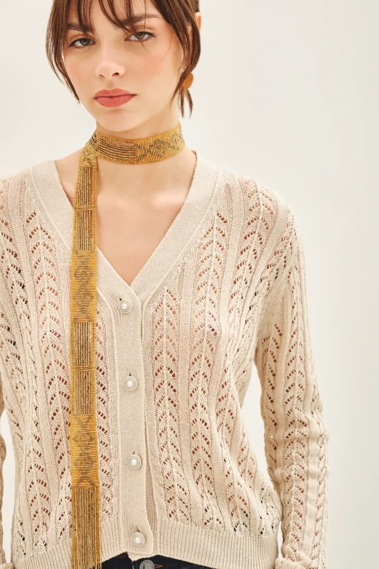 Cardigan liviano y versátil en punto desagujado para un look elegante y cómodo de Rapsodia en Buzos y Sweaters para argentina
