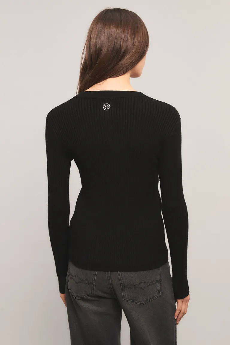 Cardigan de corte entallado con cierre central metálico y mangas largas de estilo minimalista de Kosiuko en Buzos y Sweaters para argentina