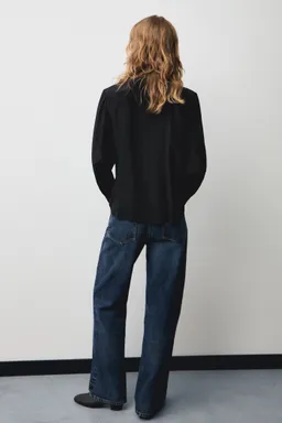 Camisa satinada con lazada de Mango en Camisas para argentina