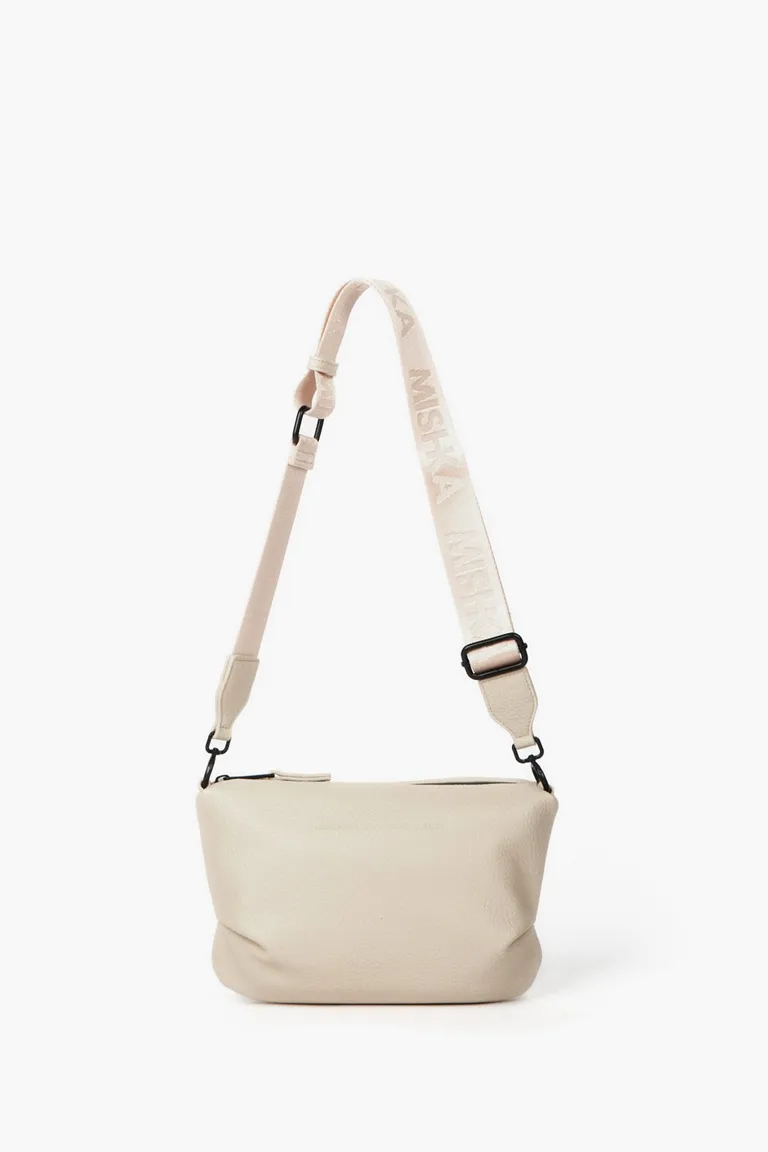 Bandolera con correa ajustable grabada y compartimentos internos de Mishka en Bolsos y Carteras para argentina