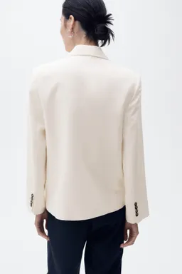 Blazer doble botonadura contraste de Mango en Blazers para argentina
