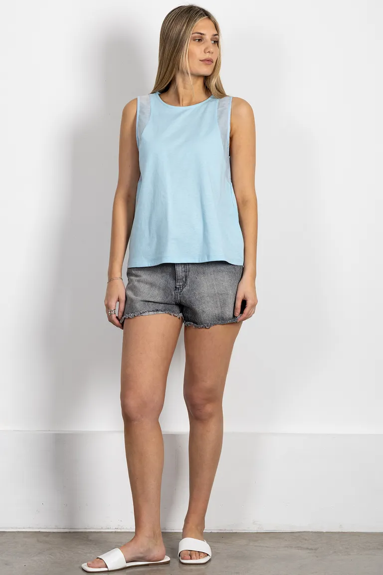 Remera de jersey de algodón en color celeste con detalles en tela sedita de Kill en Remeras para argentina