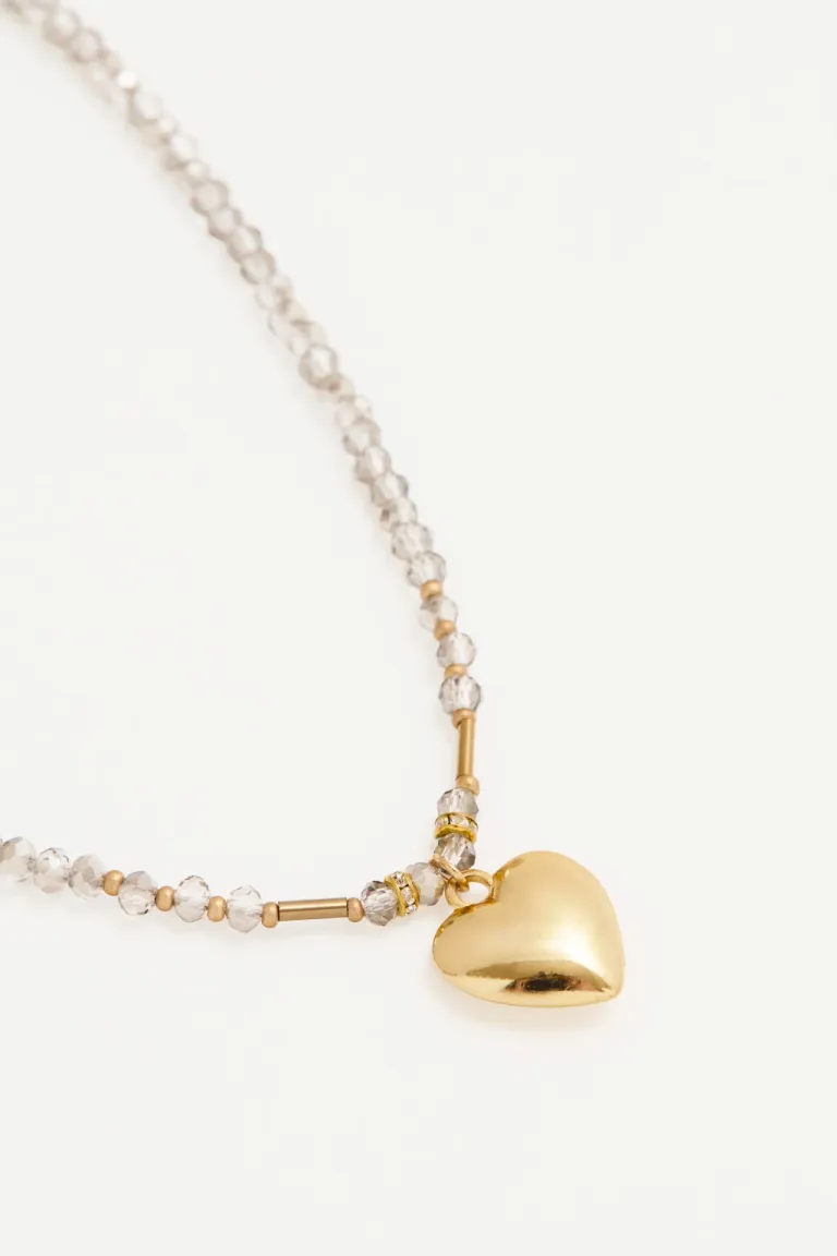 Collar de piezas facetadas y dije de corazón - Elegante complemento para tu estilo de Rapsodia en Bijouterie para argentina