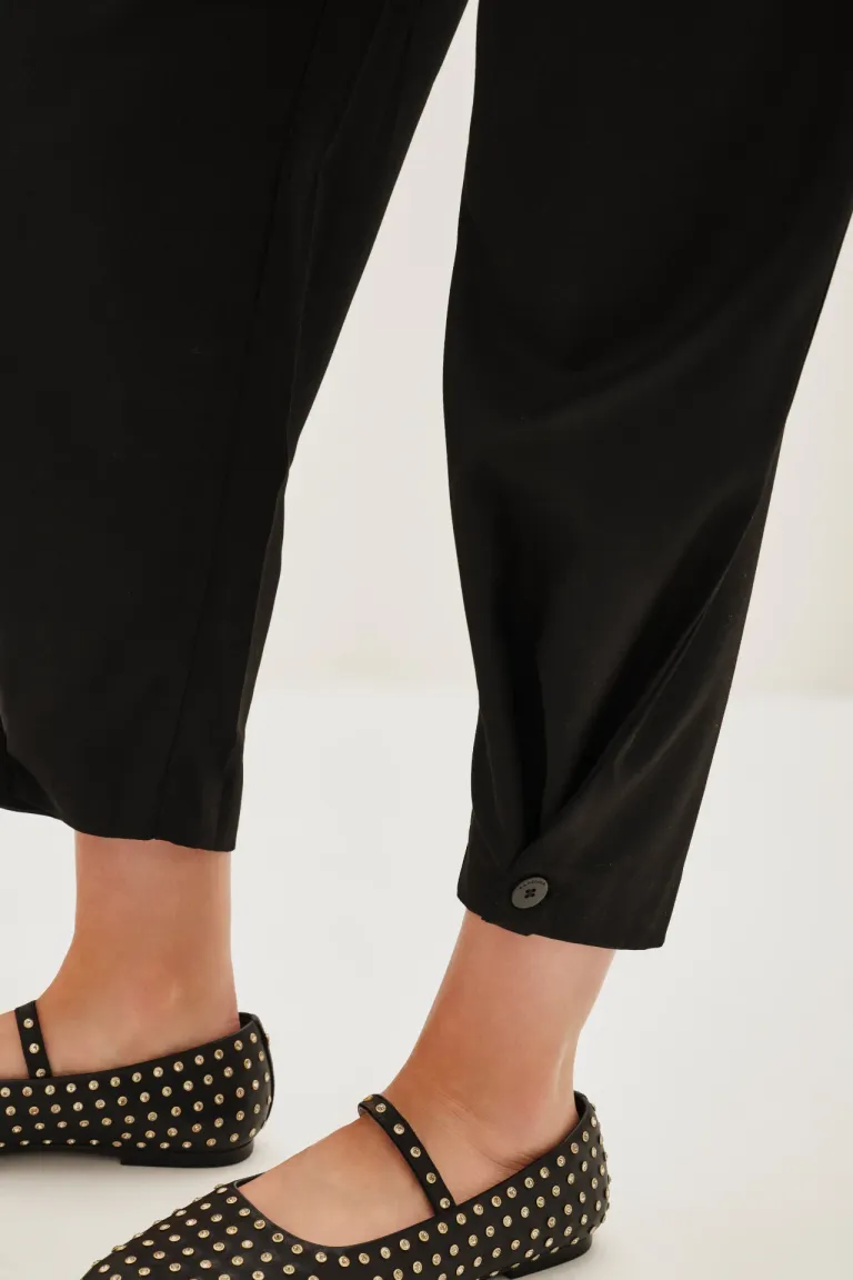 Pantalón de corte amplio con ajuste en ruedo y bolsillos funcionales de Rapsodia en Pantalones para argentina