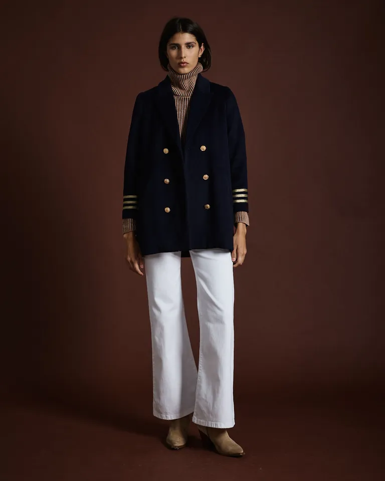 Polera de corte amplio con cuello alto tajos laterales y costuras a la vista de Wanama en Buzos y Sweaters para argentina