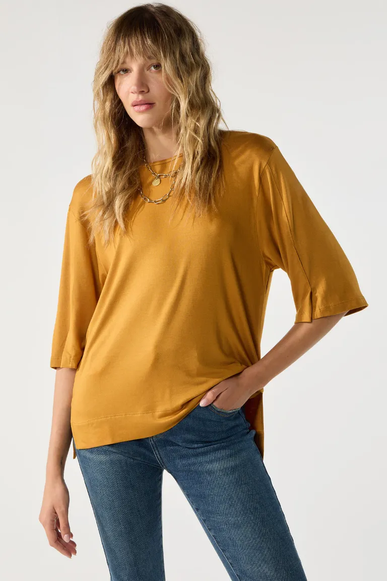 Remeron de viscosa con escote redondo y mangas al codo con abertura de Cuesta Blanca en Remeras para argentina