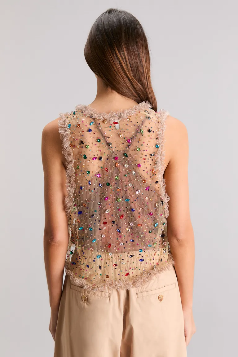 Bolero de tul bordado con piedras de colores en tonos neutros de Kosiuko en Chalecos para argentina