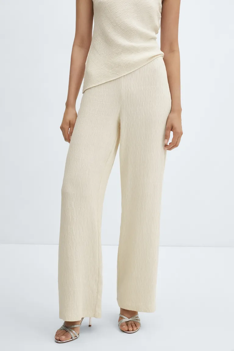 Pantalón textura wideleg de Mango en Pantalones para argentina