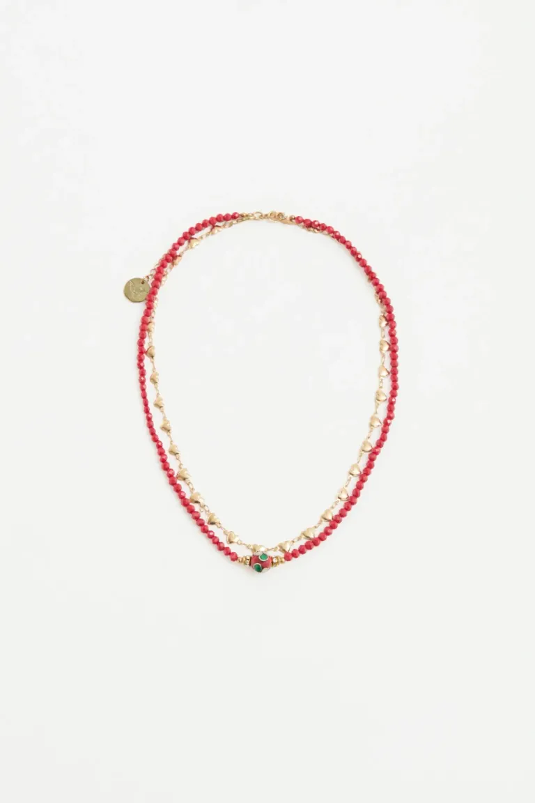 Collar doble con cadenas de mini corazones de metal y piedras facetadas con dije floral central de Rapsodia en Bijouterie para argentina