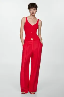 Top punto con botones de Mango en Tops para argentina