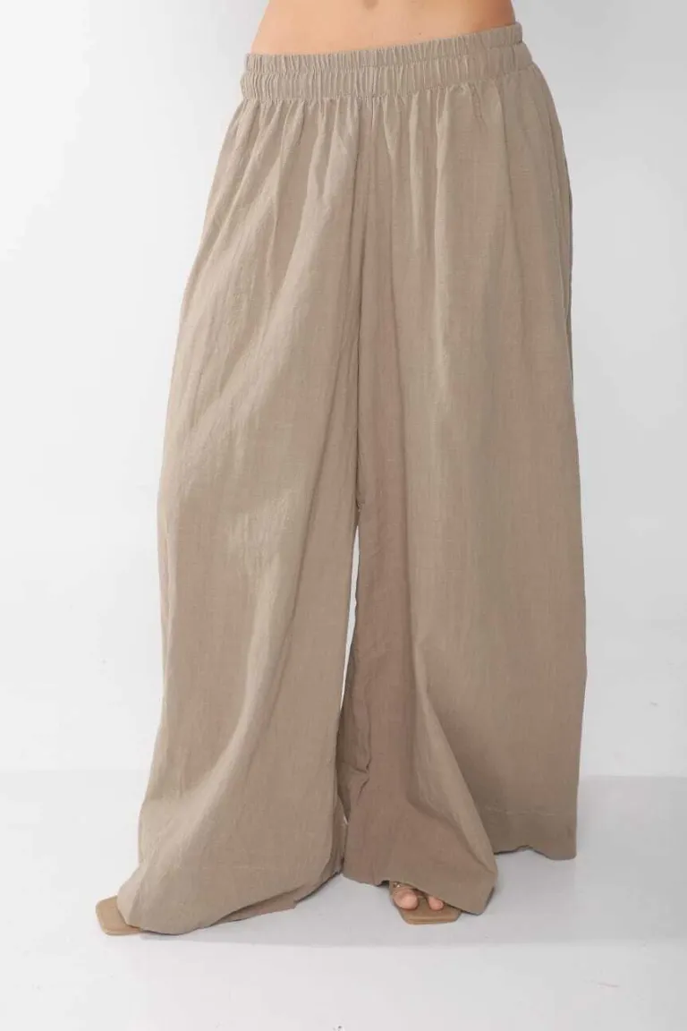 Blusa suelta de lino con pinza lateral para un look elegante y casual de Belle en Blusas para argentina