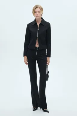 Pantalón flare con cremallera de Mango en Pantalones para argentina