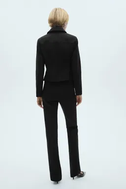 Pantalón flare con cremallera de Mango en Pantalones para argentina