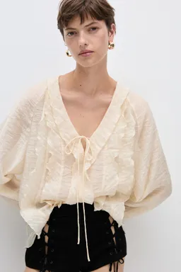 Blusa lyocell con lazo de Mango en Blusas para argentina